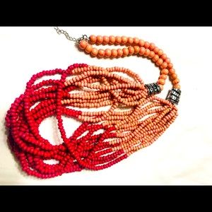 Long Coral and Magenta wooden bead necklace